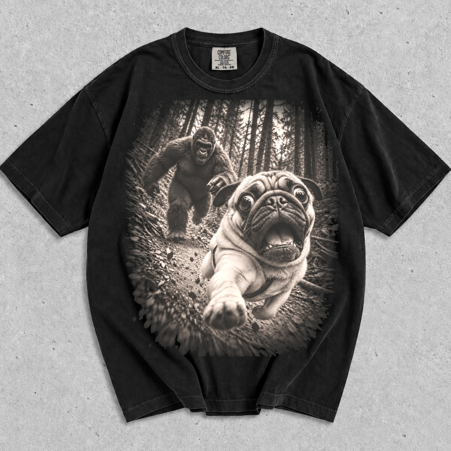 Funny Pug : Dog Running From Bigfoot T-Shirt